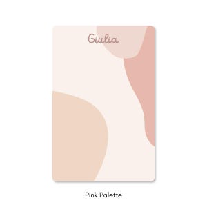 May include: A rectangular card with a soft pink and beige abstract design. The word "Giulia" is written in a cursive font at the top. The text "Pink Palette" is at the bottom.