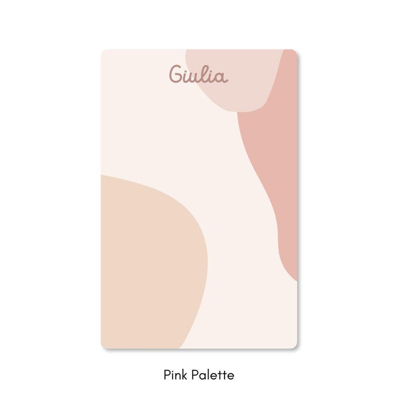 May include: A rectangular card with a soft pink and beige abstract design. The word "Giulia" is written in a cursive font at the top. The text "Pink Palette" is at the bottom.