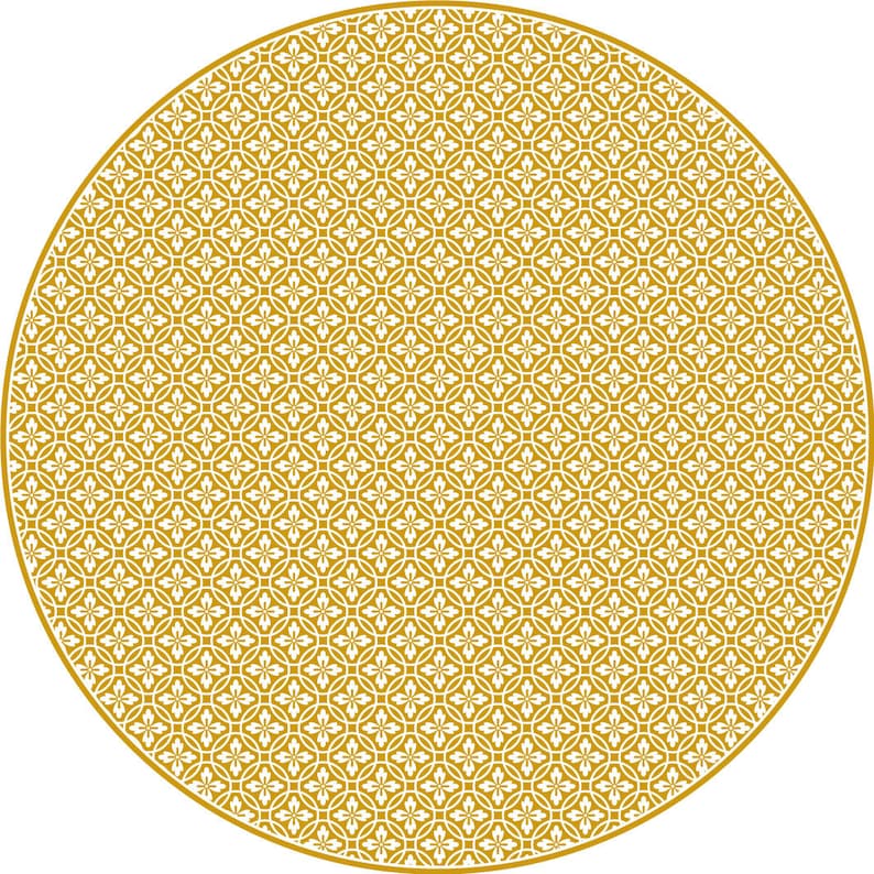 May include: A circular pattern with a gold background and white floral designs.