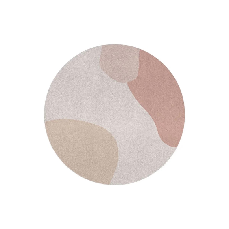 May include: A round rug with a soft, abstract design. The rug features a neutral color palette with beige, light pink, and dusty rose shapes. The rug's design is modern and minimalist, suitable for various interior styles.