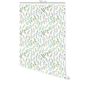 May include: A white background with a repeating pattern of green and blue leaves and red berries. The pattern is 50 cm wide.