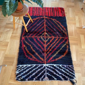 Modern Scandinavian rya rug of black red wool made in Sweden., Mid century