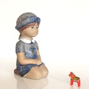Lisa Larson ceramic figurine, knee sitting girl, Gustavsberg Sweden, gift to girl.