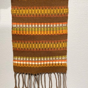 Swedish wall decor woven brown folk art tapestry.