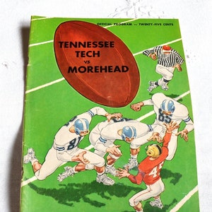 May include: Vintage football program cover featuring a brown football and players in action on a green field. The cover reads "Tennessee Tech vs Morehead" and "October 3, 1959". A referee in black and white stripes is also depicted.