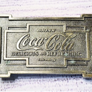 Vintage 1973 Coca Cola Belt Buckle: Bronze Tone Advertising Collectible
