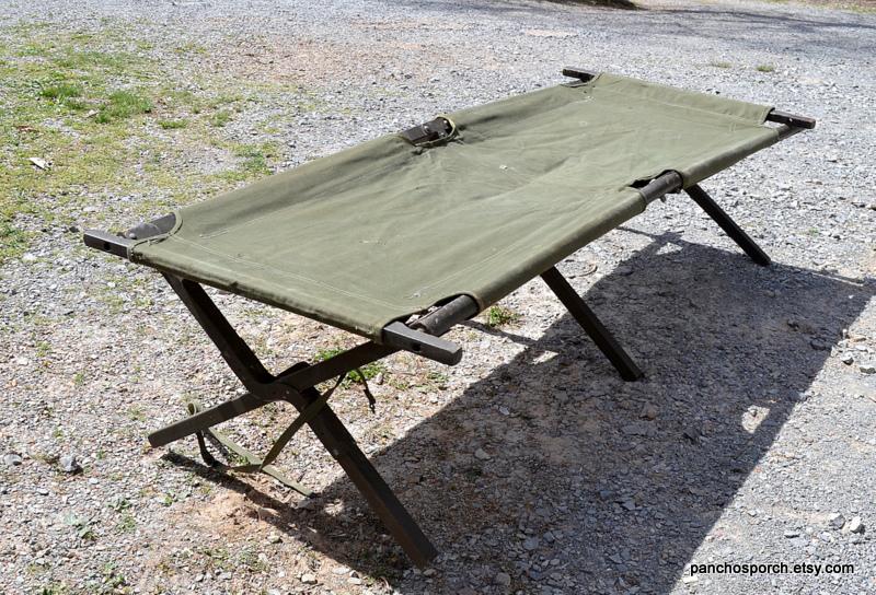 Vintage 1955 Military Folding Cot: Worn Green Canvas, Rustic