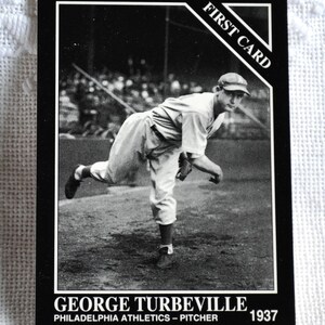 May include: Black and white baseball card featuring a baseball player pitching. The card has the text "FIRST CARD" in the top right corner and "GEORGE TURBEVILLE PHILADELPHIA ATHLETICS - PITCHER 1937" at the bottom.