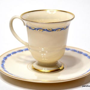 May include: A set of three ceramic mugs with a speckled, matte finish. The mugs are in shades of cream, light brown, and dark brown. Each mug has a simple, minimalist design, perfect for coffee or tea.