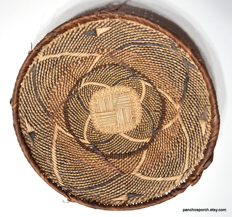 Round-flat Rattan Basket Isolated on the White Background Stock