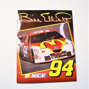 May include: A red, white, and yellow race car with the number 94 on the side. The car is a Ford Thunderbird and has the McDonald's logo on the hood. The car is on a race track and the text "NASCAR" is visible in the bottom right corner.