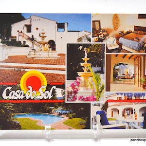 May include: Vintage postcard featuring a collage of images showcasing a resort. The postcard includes a fountain, pool, and rooms. The text "Casa do Sol" is displayed with a sun graphic.
