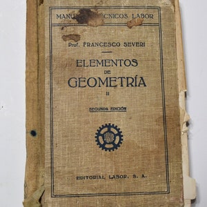 May include: A vintage book titled "Elementos de Geometria" by Prof. Francesco Severi. The book is a second edition and features a gear-shaped logo with the word "Labor" inside.