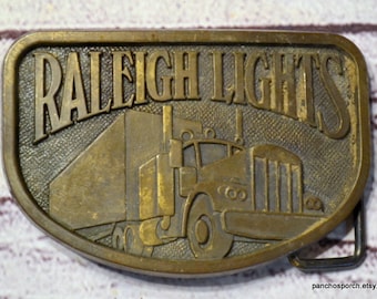 Vintage Raleigh Lights Belt Buckle Brass Semi Truck Cigarette Advertising Mens Collectible PanchosPorch