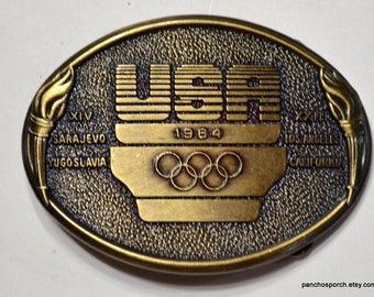 Vintage 1984 Olympic Committee Belt Buckle Brass XIII Olympic Games Sarajevo Los Angeles Gold Metal Sports Mens Accessory USA PanchosPorch