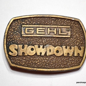 Vintage GEHL SHOWDOWN Belt Buckle Heavy Farming Machinery Solid Brass Advertising 1970s Western Wear Cowboy Mens Accessory PanchosPorch