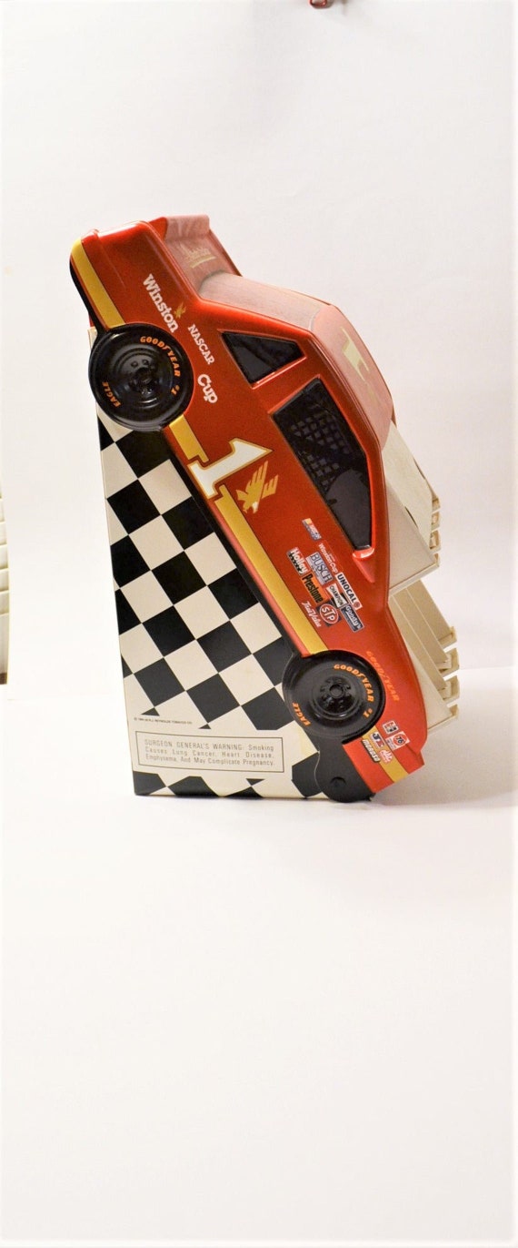 winston cigarettes nascar Sold at Auction: (Cigarette) Cup Series w/Nascar Metal Sign (TAC) Winston Cigarettes NASCAR Keychain NEW on card 1991 Heres a Winston Motorsports Series 20th Anniversary keychain for your tobacco collection from Winston Cigarettes Winston Cigarettes - Nascar Sponsor