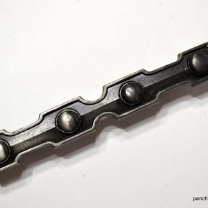 May include: A rectangular, antique silver-toned metal drawer pull with four rounded, raised rivets. The hardware has a distressed finish and is set against a white background. The Etsy shop name "panchosporch.etsy.com" is visible.