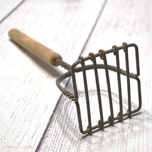 May include: A rustic wooden sign with the text "Welcome to our home" in white lettering. The sign features a distressed finish and a simple, inviting design, perfect for entryway decor.