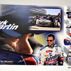 May include: A promotional poster for Mark Martin featuring images of the race car driver, his car, and merchandise. The poster includes the Valvoline and Cummins logos, and the text "#1 Choice of Top Mechanics."