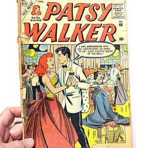 May include: Vintage Patsy Walker comic book cover. The cover features a colorful illustration of a couple dancing at a ball, with the title "Patsy Walker" in large, bold letters. The comic is issue number 68.