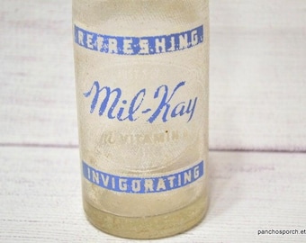 Vintage Mil-Kay Soda Bottle: 10 oz Clear Glass ACL Advertising