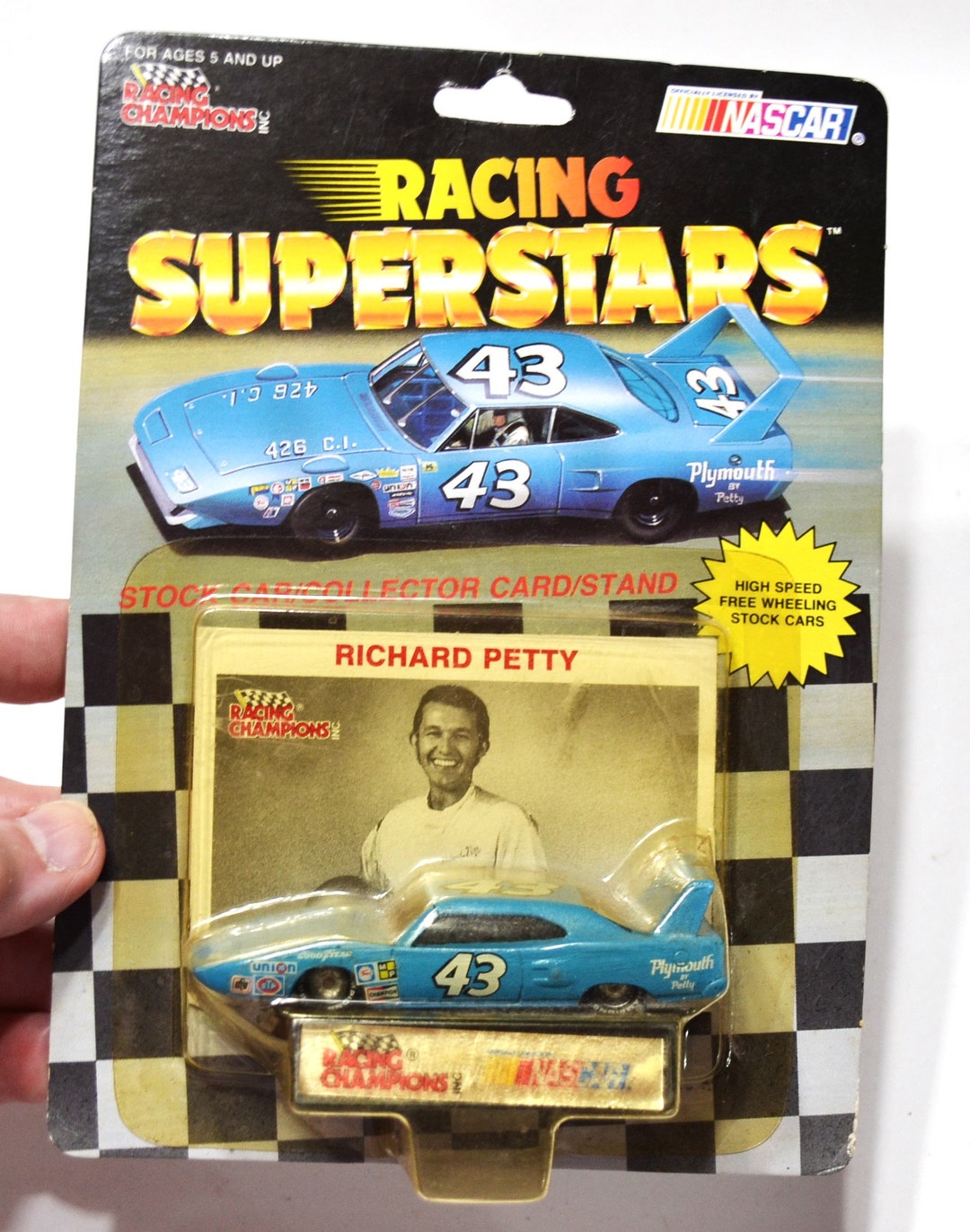 Richard Petty #43 Plymouth NASCAR Diecast Car & Goodyear Tire Display - 1:64 Scale 1991 Racing Champions