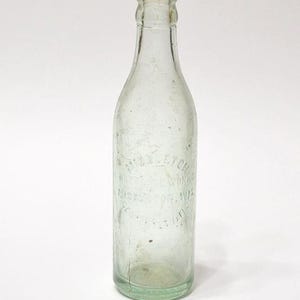 Vintage Middleton Bottling Works Bottle: Pale Green Embossed Glass