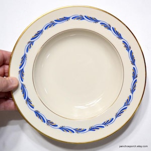 May include: A set of three ceramic mugs with a speckled, matte finish. The mugs are in shades of cream, light gray, and dark gray. Each mug has a simple, minimalist design, perfect for coffee or tea.