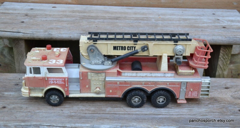 Vintage Metro City Firetruck: Distressed Plastic Toy Fire Engine