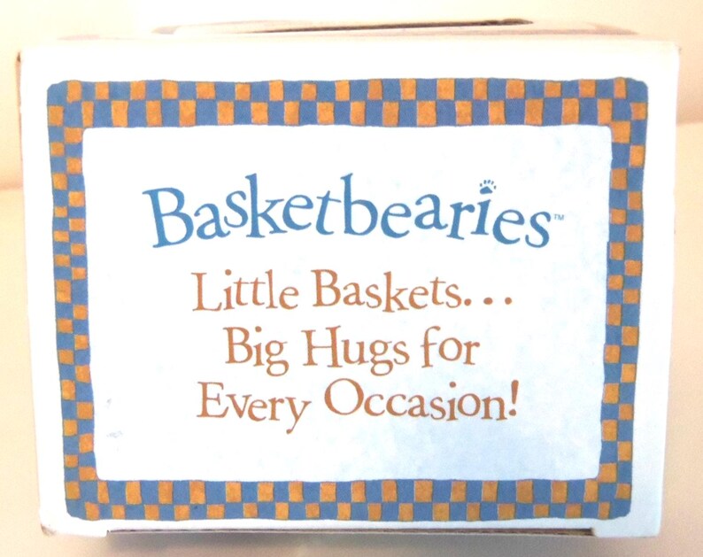 May include: A white box with the text "Basketbearies" in blue script, with the tagline "Little Baskets... Big Hugs for Every Occasion!" The box has a blue and orange checkered border.