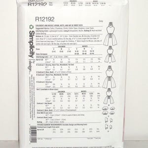 May include: A Simplicity pattern envelope featuring instructions for children's and misses' aprons, mitts, and a hat. The package includes diagrams and measurements in inches and yards, with sizes ranging from children's S(3-4) to misses' L(16-18).