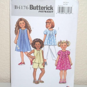 May include: A Butterick B4176 sewing pattern envelope for sizes 6, 7, and 8. The front features illustrations of four outfits: a blue dress, a light blue floral top with white trousers, a yellow plaid top with shorts, and a pink floral dress.