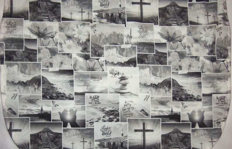 May include: A fabric featuring a black and white collage of religious imagery, including crosses, landscapes, flowers, and stacked stones. Text overlays include phrases like "Walk by faith not by sight," "The Lord is my rock," and "Be still and know."