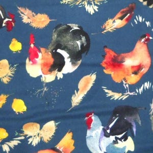 May include: Watercolor fabric with a navy blue background featuring roosters, hens, chicks, nests with eggs, and feathers. The roosters and hens are in shades of red, orange, black, and blue. The chicks are yellow, and the feathers are tan.