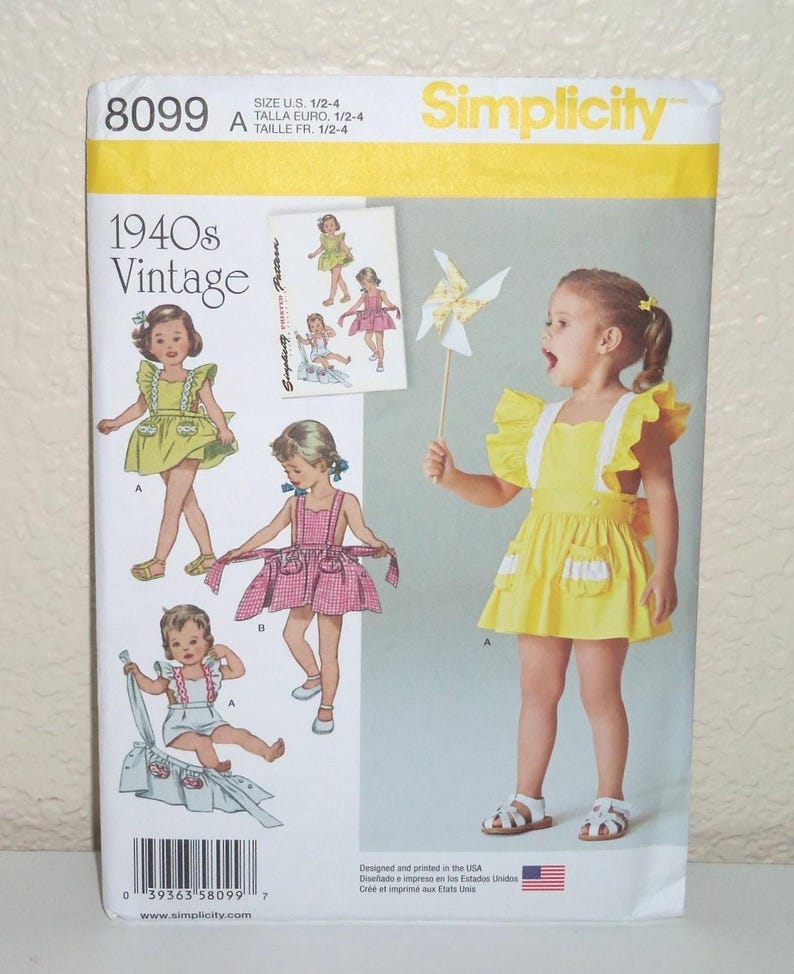 May include: A Simplicity sewing pattern envelope 8099 for 1940s vintage style children's clothing. The front displays illustrations and a photograph of a child wearing a yellow dress with ruffled straps and pockets, alongside a pinwheel.