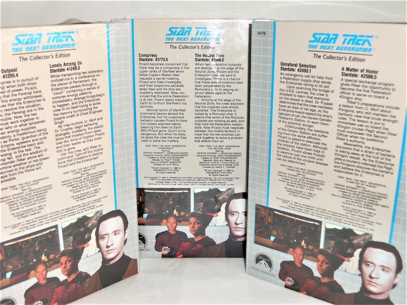 May include: Three Star Trek The Next Generation Collector's Edition VHS tape sleeves featuring episode summaries for Conspiracy, The Neutral Zone, Unnatural Selection, and A Matter of Honor. Each sleeve displays blue logos and cast photographs.