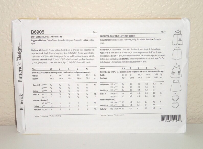 May include: A white Butterick sewing pattern envelope labeled B6905 for baby overalls, a dress, and panties. The back of the envelope displays technical illustrations of the garments, lists suggested fabrics, notions, and detailed sizing charts.