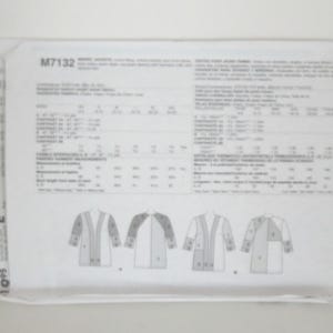 May include: A white sewing pattern envelope labeled M7132 for jackets. The back of the envelope displays technical illustrations of two jacket styles, labeled A and B, along with detailed sizing charts, fabric requirements, and instructions in English.