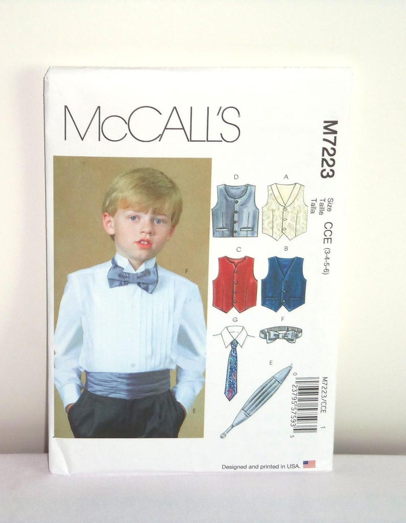 May include: A McCall's sewing pattern for a boy's vest and bow tie. The pattern is for sizes 3-4-5-6. The pattern includes instructions for making a vest, bow tie, and cummerbund. The pattern is designed and printed in the USA.