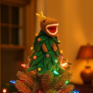 Tree-Rex kerstboomtopper: handgemaakte naaldvilten dinosaurus