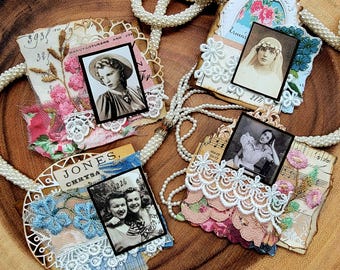 Charming vintage layered collage tags ephemera clusters. Journal laces doilies lace embellishments