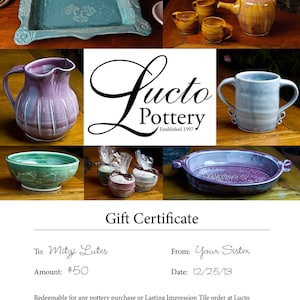 May include: Gift certificate for Lucto Pottery, a pottery studio in Salvisa, Kentucky. The certificate is for $50 and is redeemable for any pottery purchase or Lasting Impression Tile order at Lucto Pottery. The certificate is dated 12/25/13 and is from Your Sister to Mitzi Lutes.