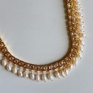 Samra gold plated simple polki set with chandbalis