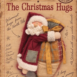Pode incluir: Uma boneca de pano do Papai Noel segurando um grande saco de patchwork, em um fundo de papel estilo vintage com texto incluindo The Magical Tales of Laura Mori, The Christmas Hugs, Warmest hugs from the North Pole e Made with love.