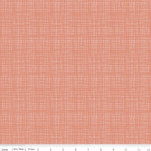 May include: A coral pink fabric with a woven texture. The fabric has a subtle white grid pattern.