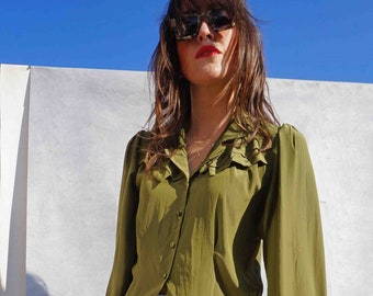 green ruffle blouse