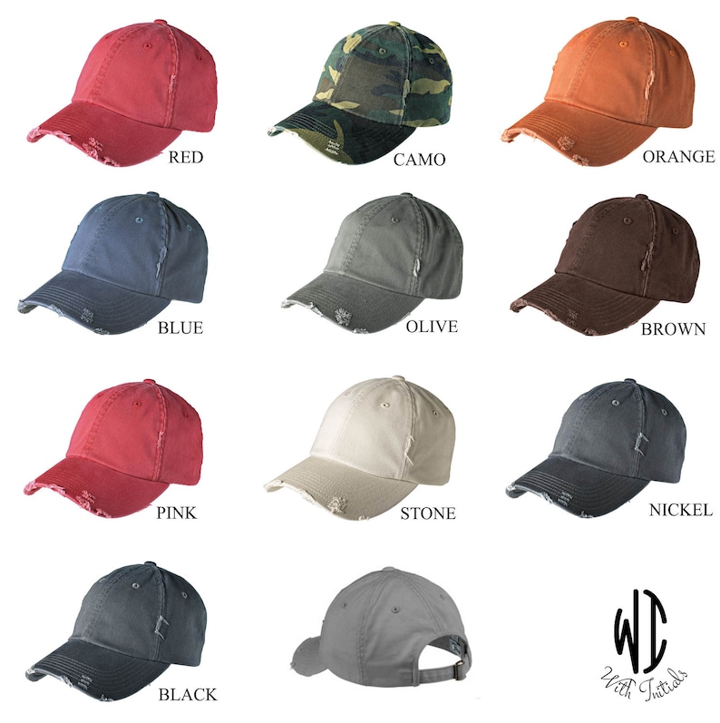 May include: Ten distressed baseball caps in various colors, including red, camo, orange, blue, olive, brown, pink, stone, nickel, and black. The caps have a distressed look with frayed edges and a slightly faded appearance. The caps are all the same style, with a curved brim and a small logo on the back.
