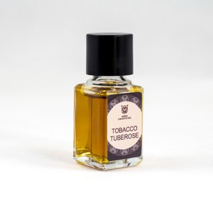 Tobacco tuberose olfactory art in a bottle, floral and learhery, with galbanum, tuberose, tobacco and agarwood Flacon. image 1