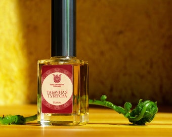 Tobacco tuberose  - olfactory art in a bottle,  floral and learhery, with galbanum, tuberose, tobacco and agarwood Flacon.